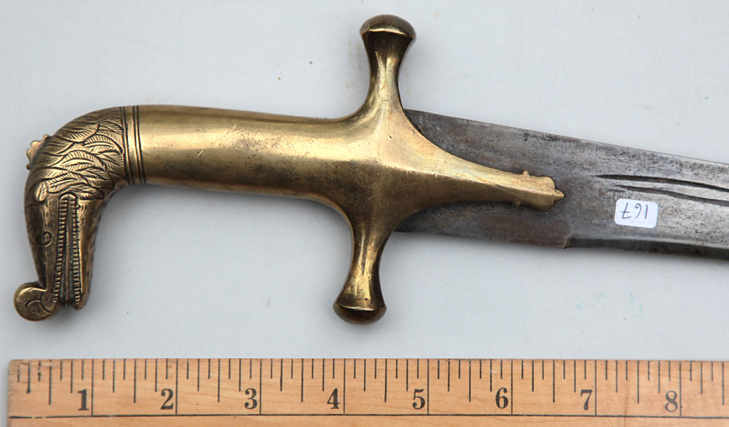 Indian tulwar brass monster head hilt